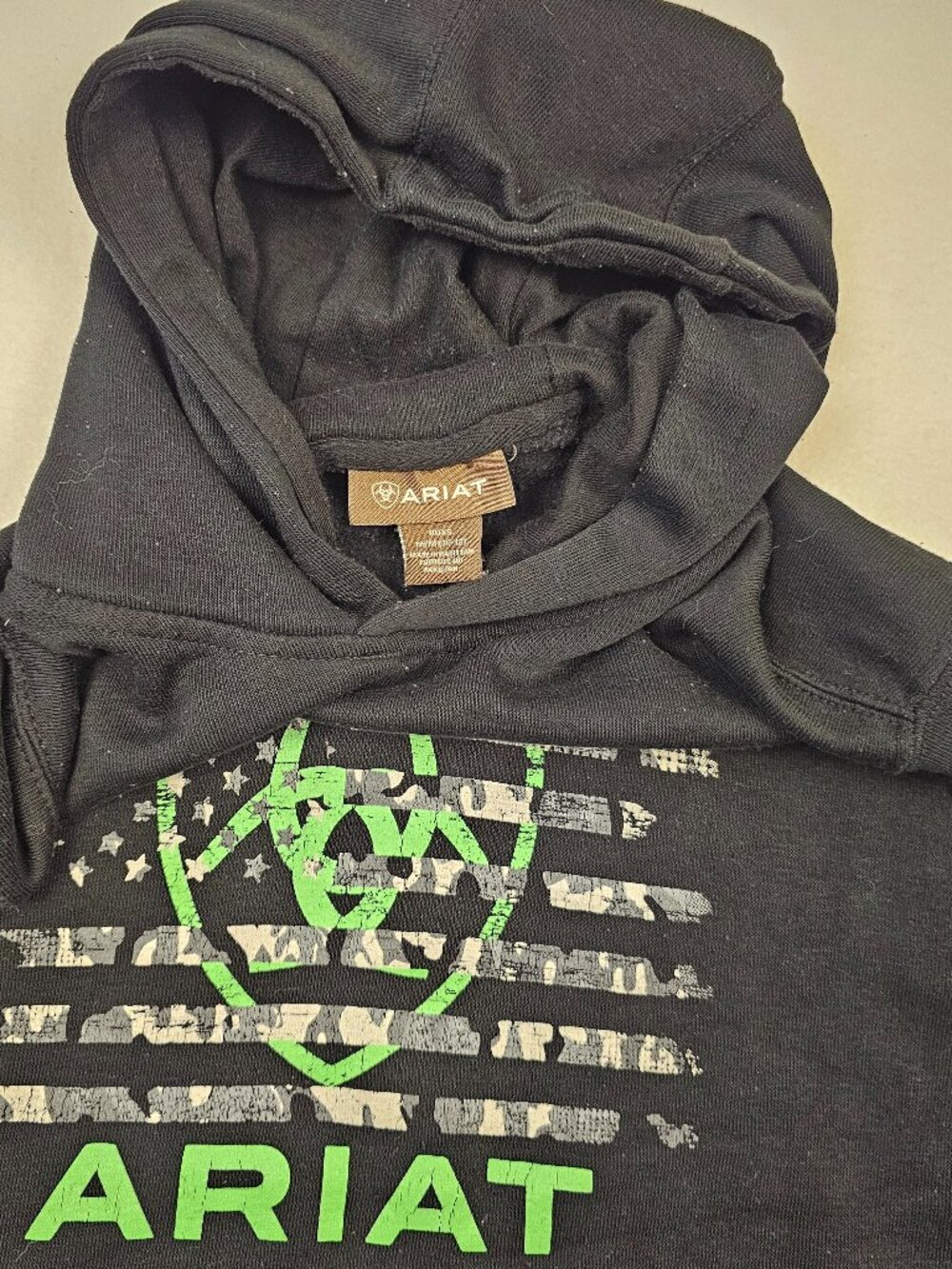 Ariat Boy’s Hoodie Sweatshirt black neon green "Black Flag" graphic on slv